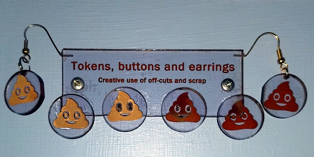 Poop-themed buttons.