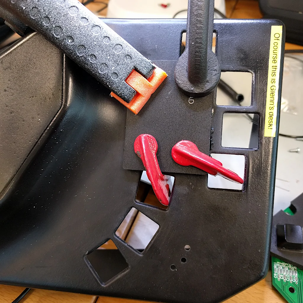 Trackpad clamped to BAT case while glue cures.